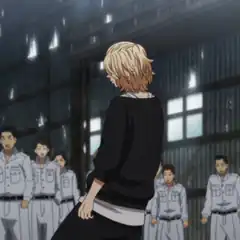 Blonde anime boy in black shirt facing group in uniforms