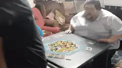 Man flips table in anger
