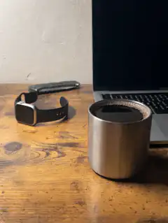 coffee cup on wooden desk