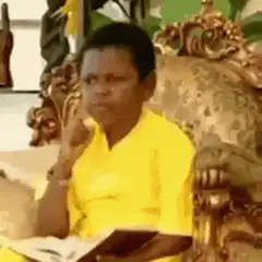 Young boy thinking with finger on chin