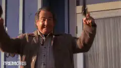 Fred Ward yelling yeah with guns