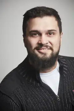 Man with beard smiling
