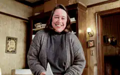 Mrs. Doubtfire throws a pillow