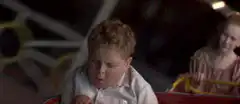 Kids covered in vomit on carnival ride