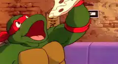 Raphael eats pizza slice