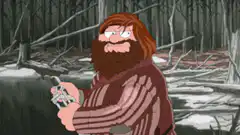 Hagrid holding a snake in the forest