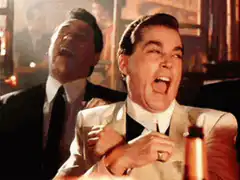 Leonardo DiCaprio laughing with Bitcoin
