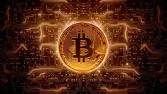 glowing bitcoin on circuit board