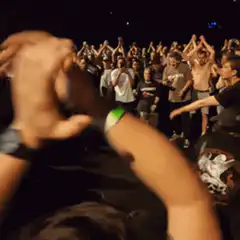 Crowd clapping for dancer