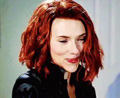 Black Widow smiling and looking down