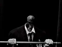 Slender Man holding a metal bar