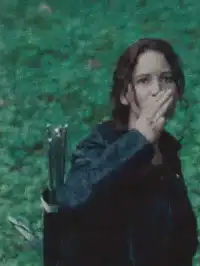 Katniss Everdeen salutes
