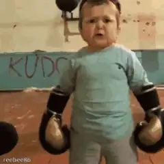 Toddler boxing in gym