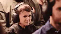 Boy with headphones smiles
