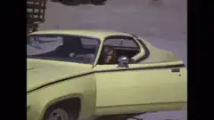woman exits car and walks to door