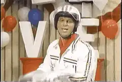 Smokey Robinson singing with balloons