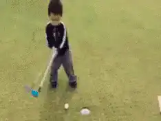 Toddler misses golf putt and celebrates anyway