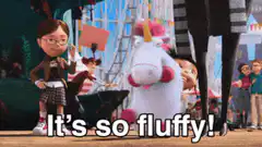Margo hugs a unicorn plush