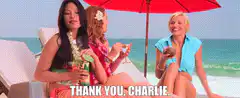 Three women on a beach saying thank you, Charlie