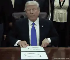 Donald Trump holds up NO sign