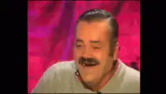Man laughing and another man facepalming