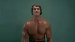 Arnold Schwarzenegger lifting weights