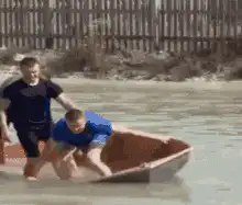 Men in boat salute then sink