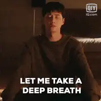 Man taking a deep breath
