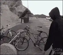 Guy steals bike and rides away