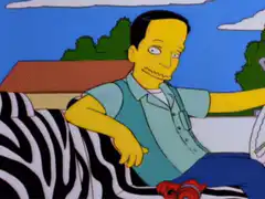 Krusty the Clown holding a ketchup bottle