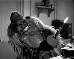 King Kong holding a flaming bottle