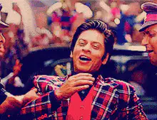 Shah Rukh Khan laughing with friends