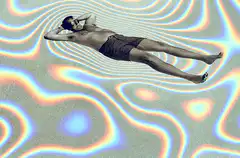 Man floating on psychedelic background