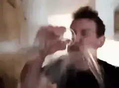 man blowing smoke ring
