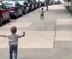 Toddler runs to hug another toddler