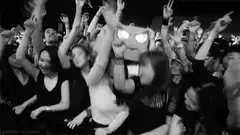 angry emoji mascot crowd surfing