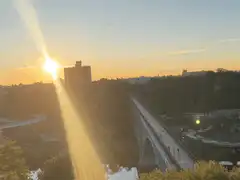 Sunset over bridge with lens flare