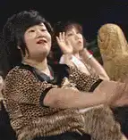 Woman in leopard print dancing