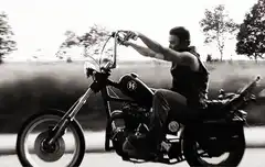 The Walking Dead Rick Grimes riding motorcycle