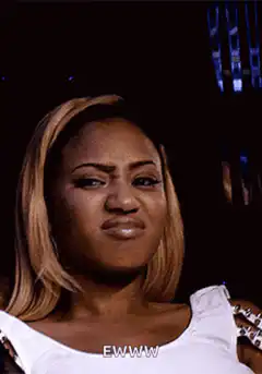 Woman making disgusted face