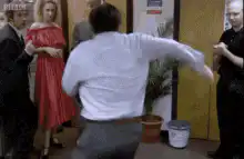 David Brent dances at a party