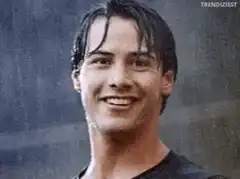 Keanu Reeves giving a thumbs up