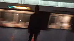 Silhouette watching train pass