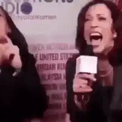 Kamala Harris and Naomi Campbell laughing