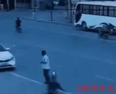 Man hits car with rock