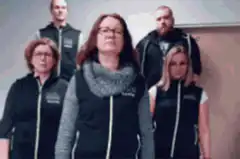 Woman in vest doing arm movements