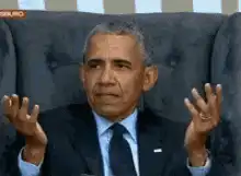 Obama shrugging hands
