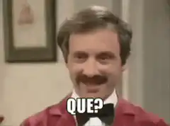 Man in red suit saying Que?