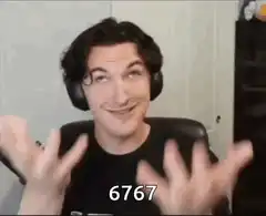 Man with headphones smiling and wiggling fingers
