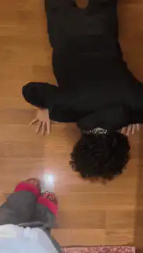 person crawling on floor